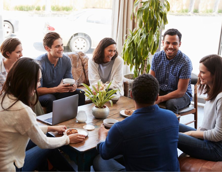 People in support group circle