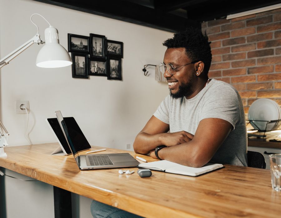 Smiling man sitting at desk